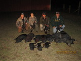 10 pigs and 4 happy hunters